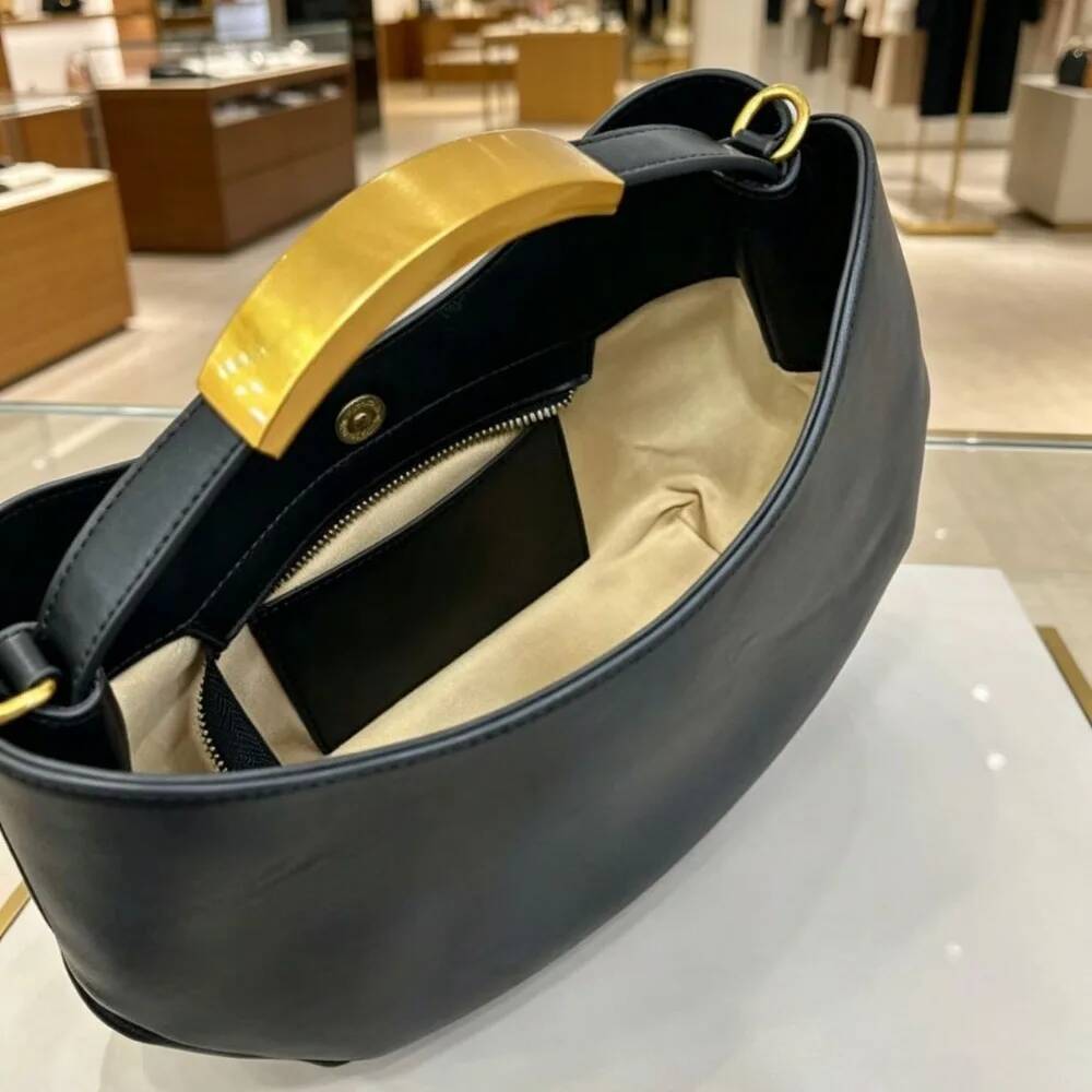 Borsa a secchiello da donna a  - Women Bags Golden recensione e prezzo